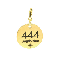 Load image into Gallery viewer, Gold pendant with '444 Angels Near' engraving on a white background