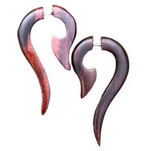 Load image into Gallery viewer, A pair of brown, lily flower shaped earrings with a natural, wood grain appearance, designed for regular pierced ears.