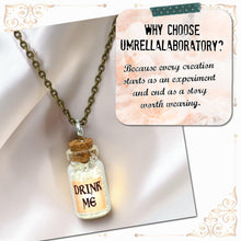 Load image into Gallery viewer, Drink Me Bottle Necklace Glass Vial Fantasy Jewelry Aqua Blue Rusty Glow in the Dark
