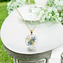Load image into Gallery viewer, Pressed flower gold plated necklace wildflower bohemian jewelry four leaf or round
