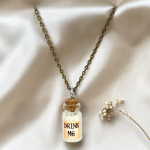Load image into Gallery viewer, Drink Me Bottle Necklace Glass Vial Fantasy Jewelry Aqua Blue Rusty Glow in the Dark