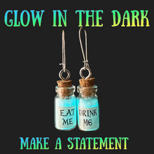 Load image into Gallery viewer, Mismatched earrings Eat Drink me glow in the dark