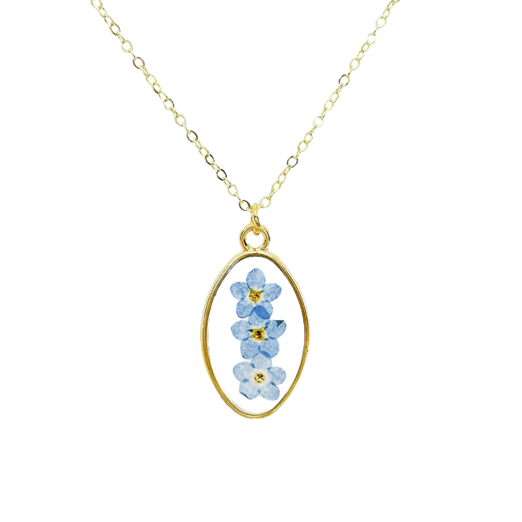 Pressed flower gold plated necklace forget me not oval white or blue