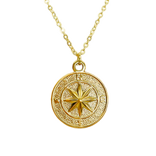 Load image into Gallery viewer, Gold compass necklace on a white background