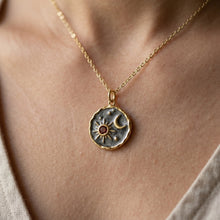 Load image into Gallery viewer, Macro close-up of 18K gold plated sun and moon celestial coin pendant craftsmanship